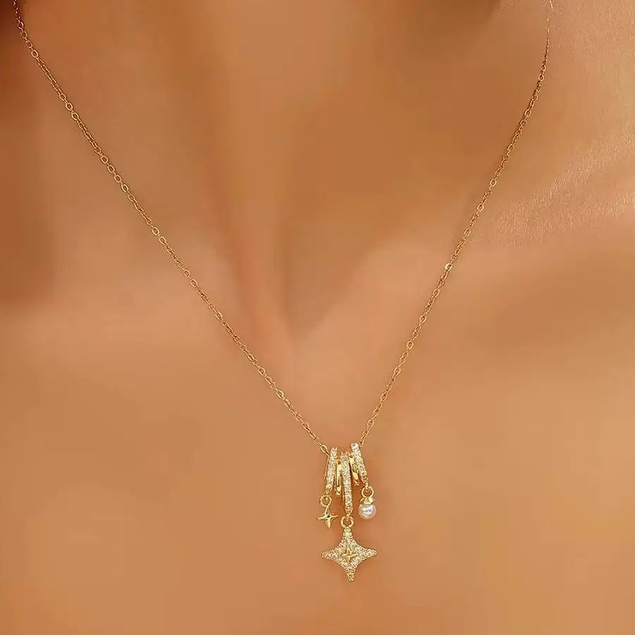 NOVORA Celestia™ | Colar Duplo Dourado com Estrela e Cristal Brilhante – Elegância Minimalista para Mulher